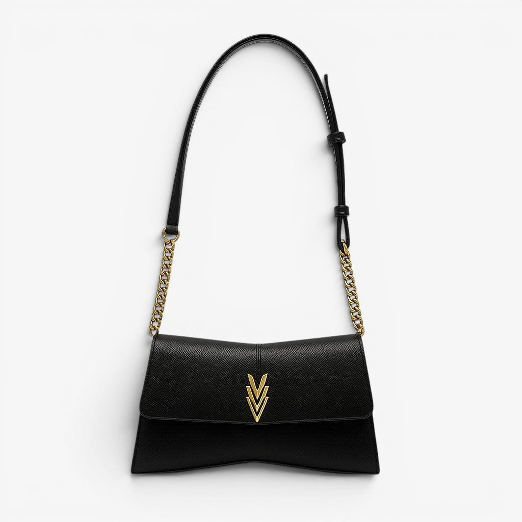 Black handbag with gold chain and logo on a white background