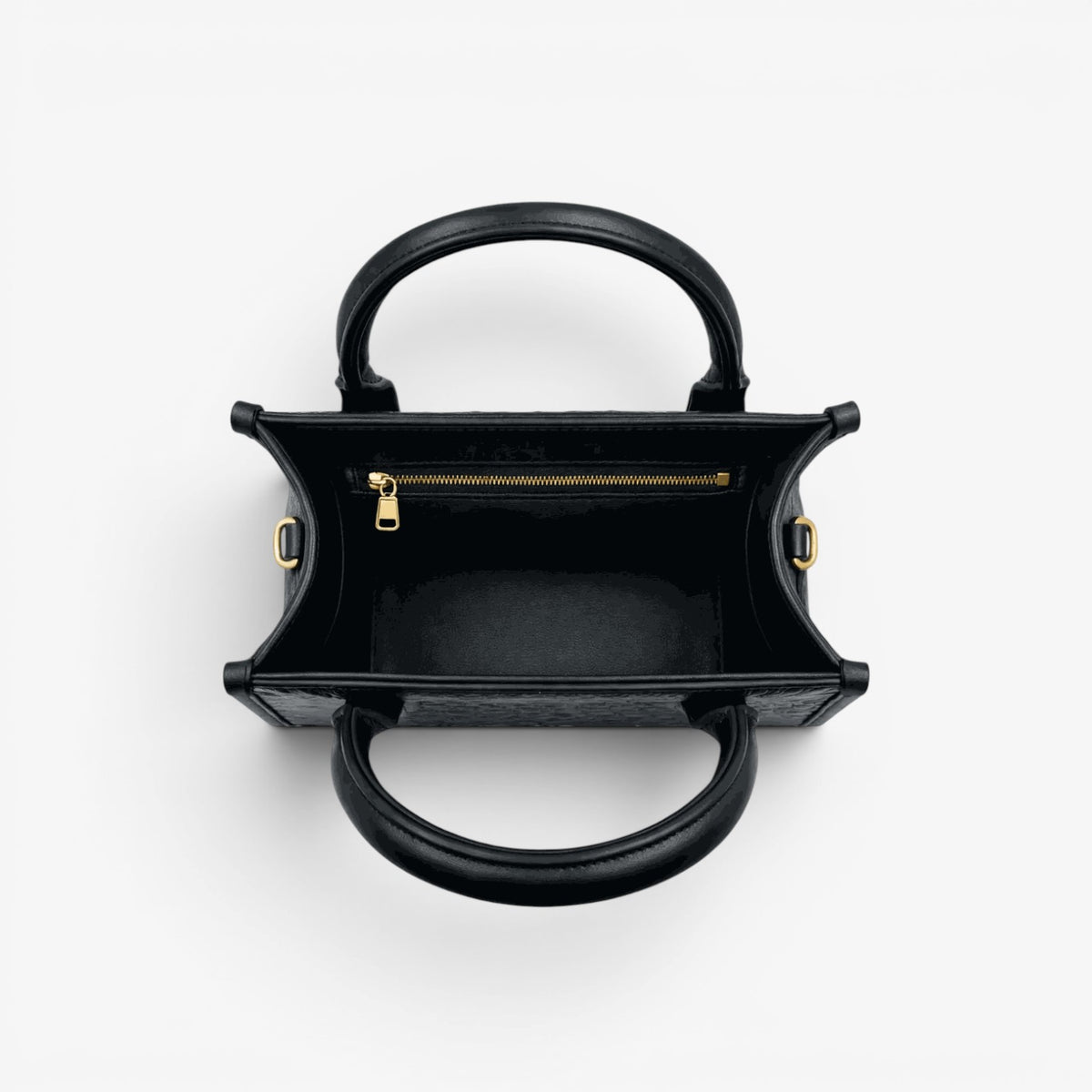 Black handbag with gold accents on a white background