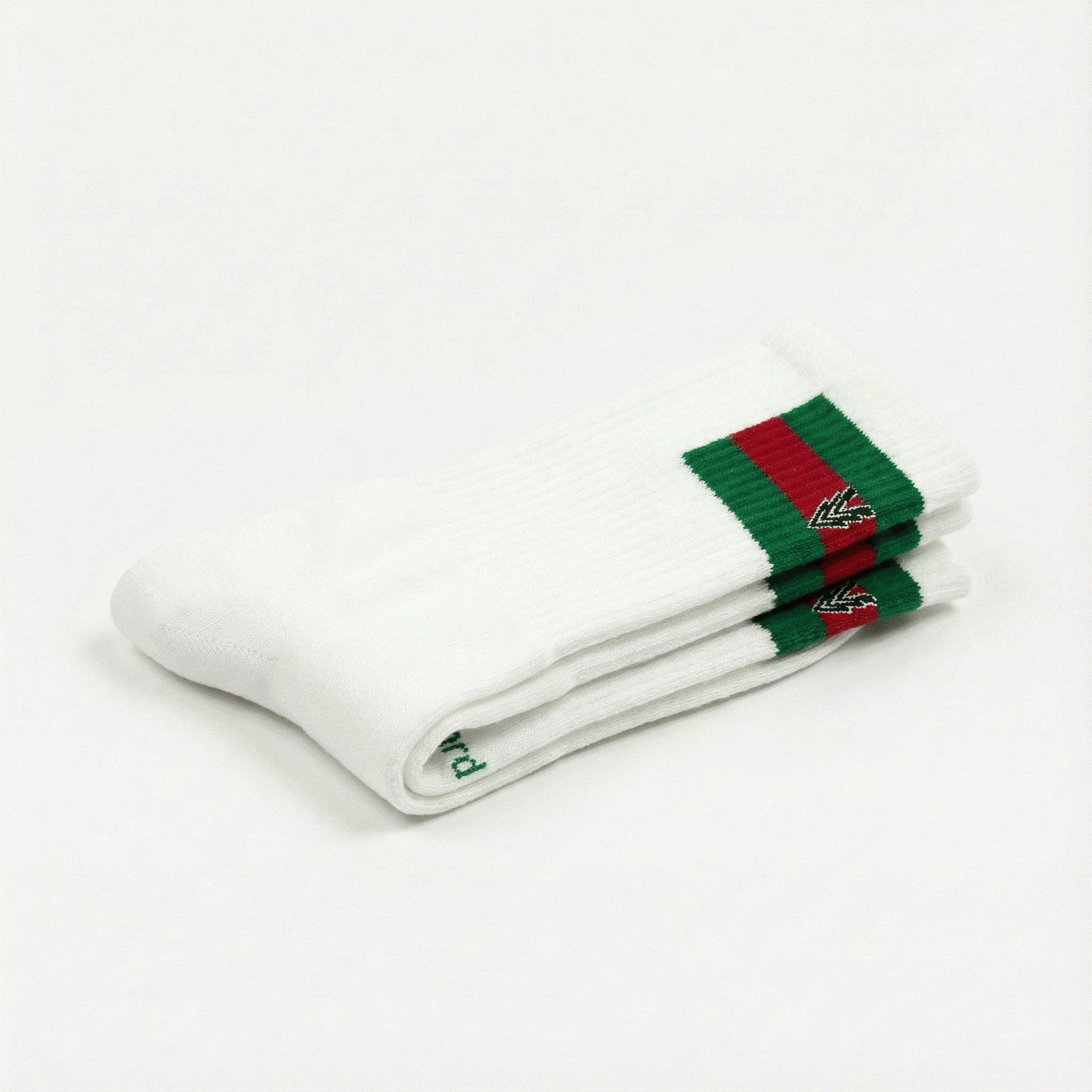 White socks with green and red accents on a white background