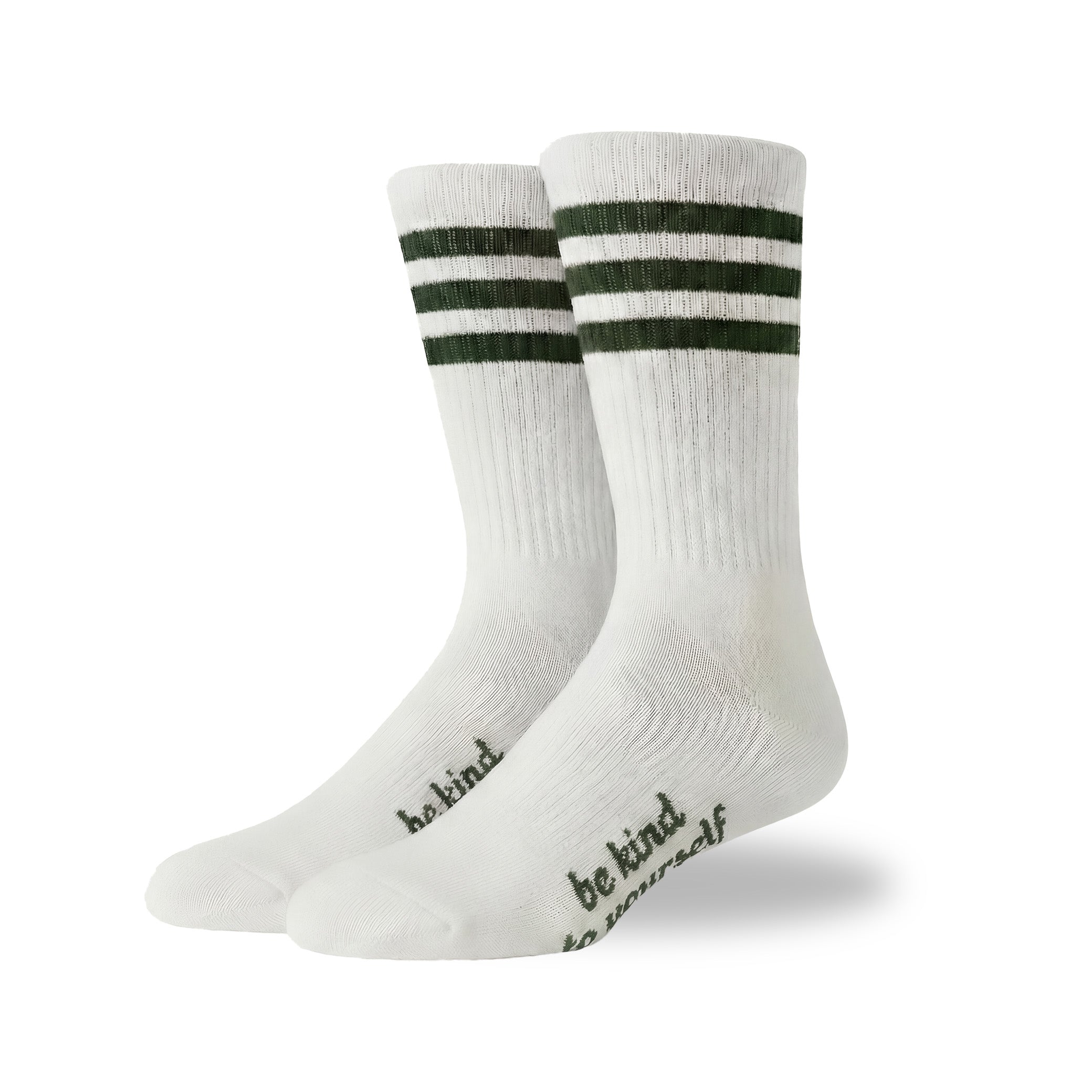 White socks with green stripes and 'be kind' text on a white background