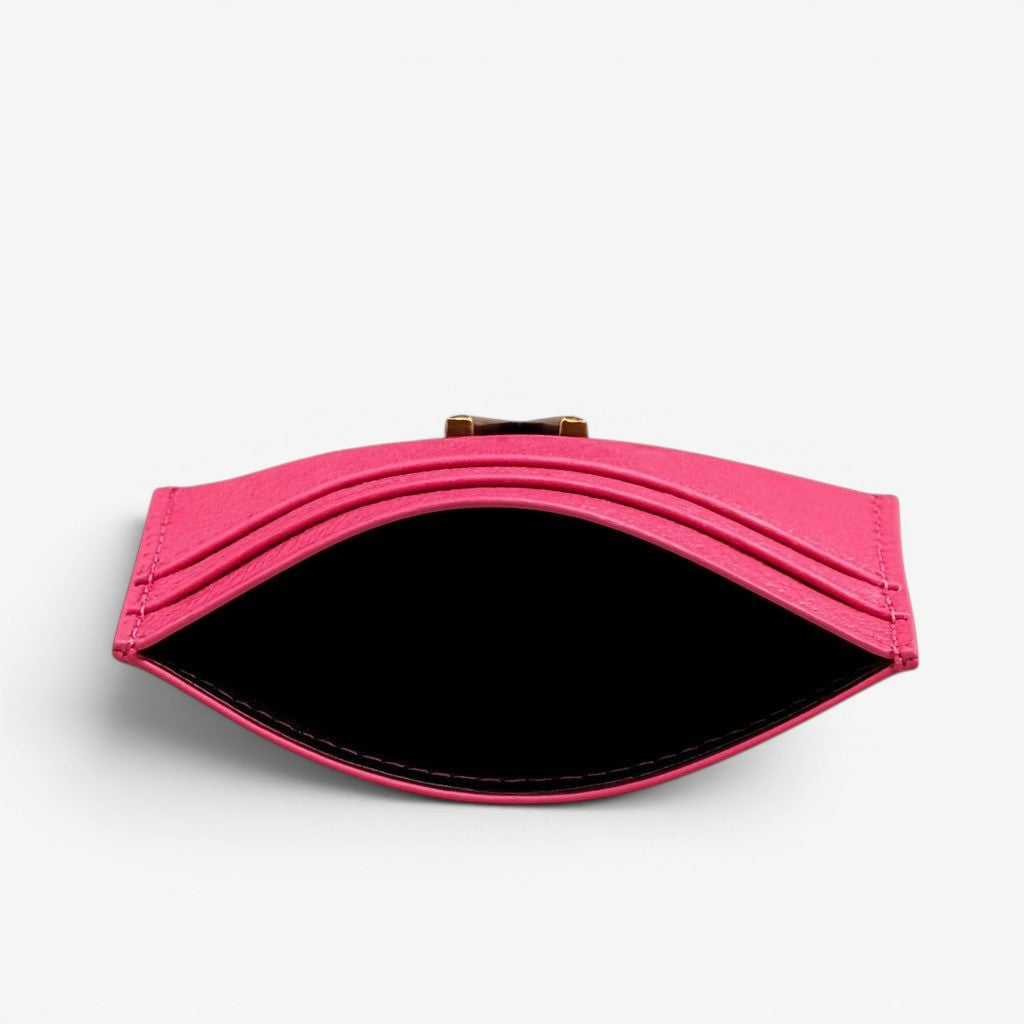 Pink clutch bag on a white background