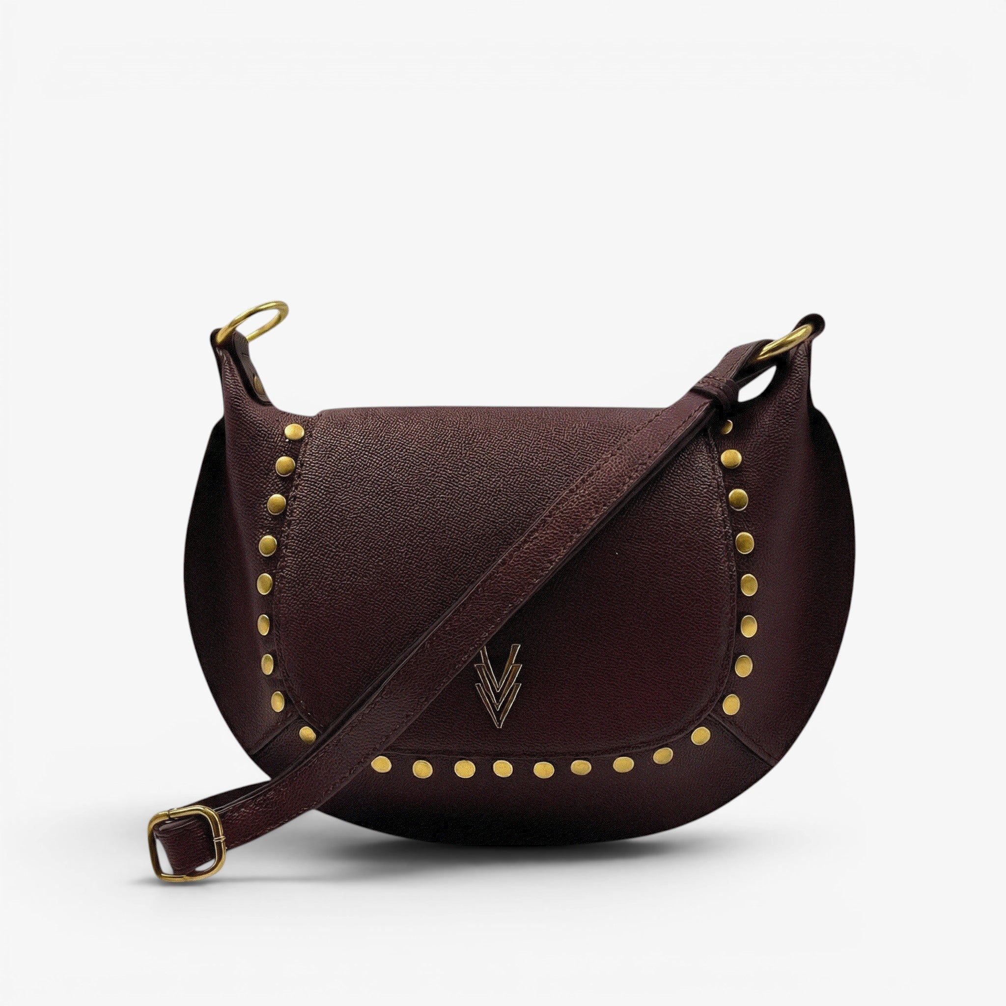 Brown leather handbag with gold studs and a visible brand logo on a light gray background