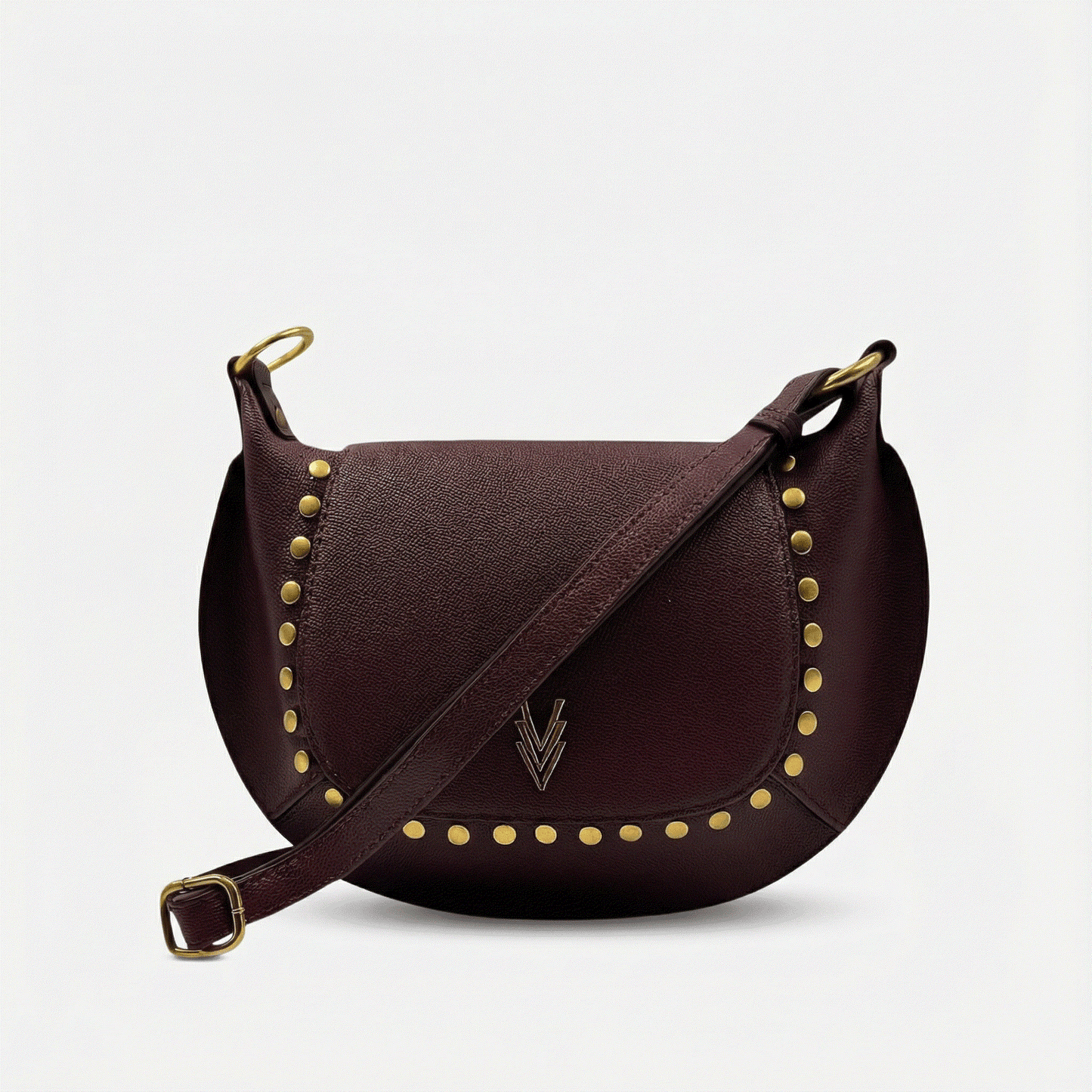 Brown leather handbag with gold studs and a visible brand logo on a light gray background