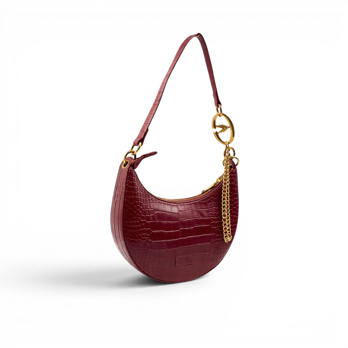 Maroon handbag with gold chain detail on a white background