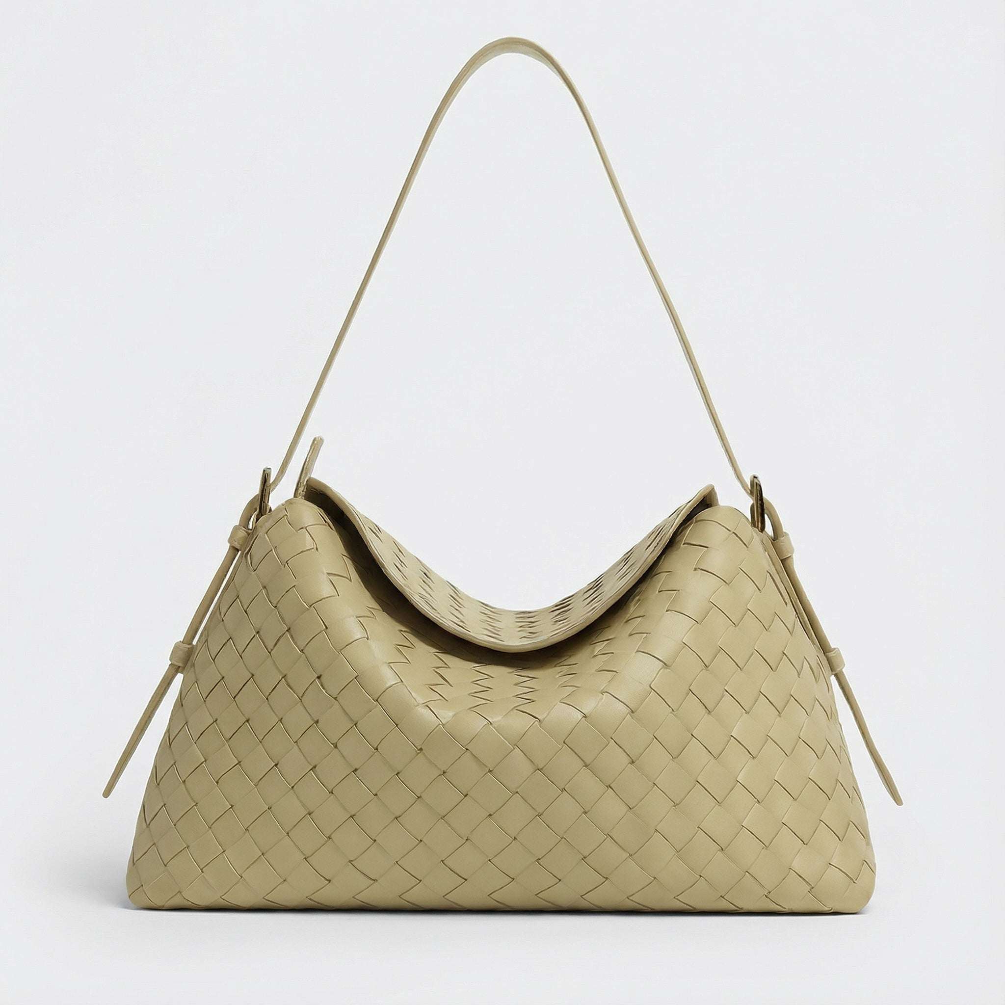 Beige woven handbag on a light gray background