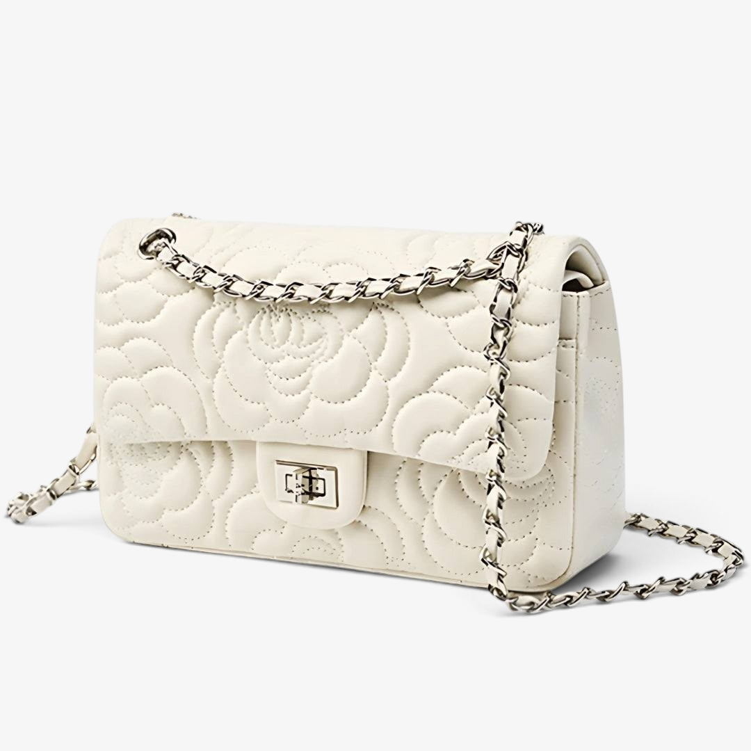 VAGOSHOPS Chiara quilted bone leather bag with a silver chain strap and polished silver-tone hardware.