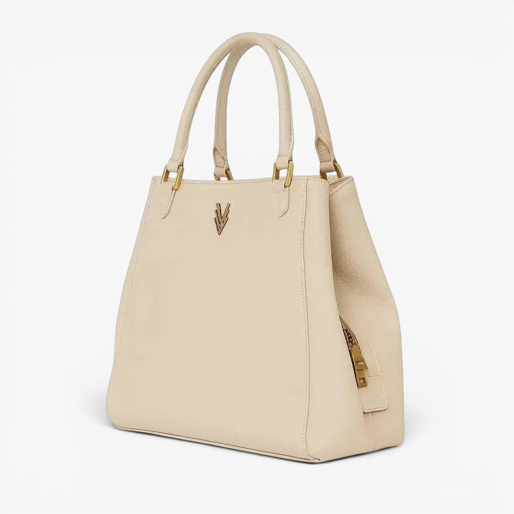 VAGOSHOPS cream pebble-embossed vegan leather Mari shoulder purse with dual straps and central zip compartment.