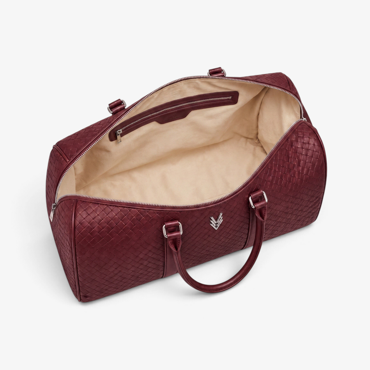 VAGOSHOPS Rocco deep cranberry leather weekend duffle bag with embossed woven texture and silver-tone hardware.