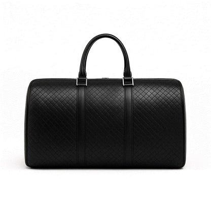 Black quilted leather duffel bag on a white background
