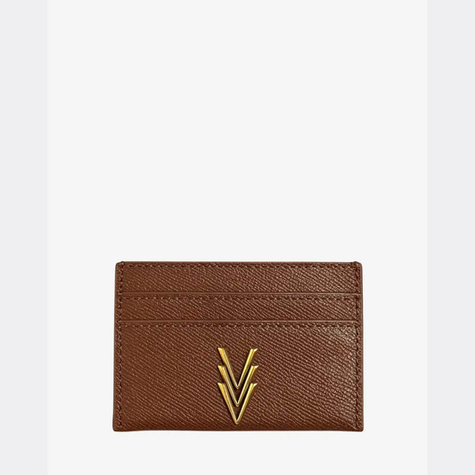 Brown leather cardholder with a gold logo on a white background