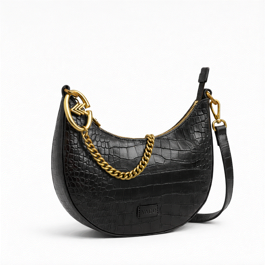 Black textured handbag with gold chain detail on a white background