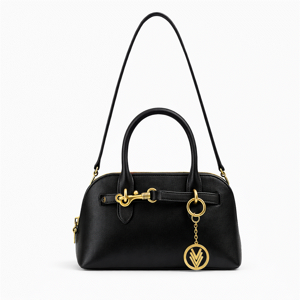 Black handbag with gold accents on a white background