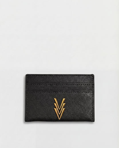 Black cardholder with gold emblem on a light gray background
