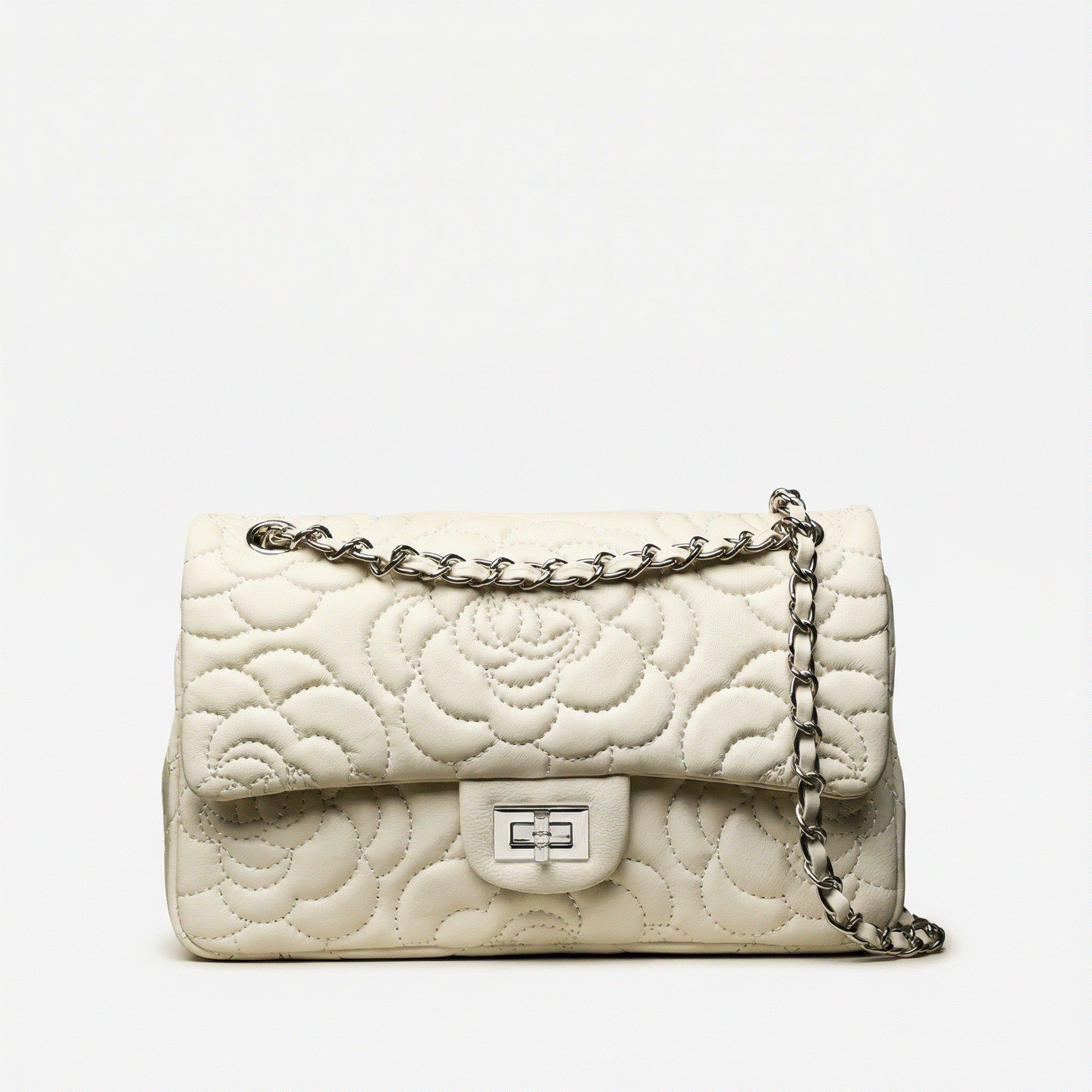 White quilted handbag with a chain strap on a white background
