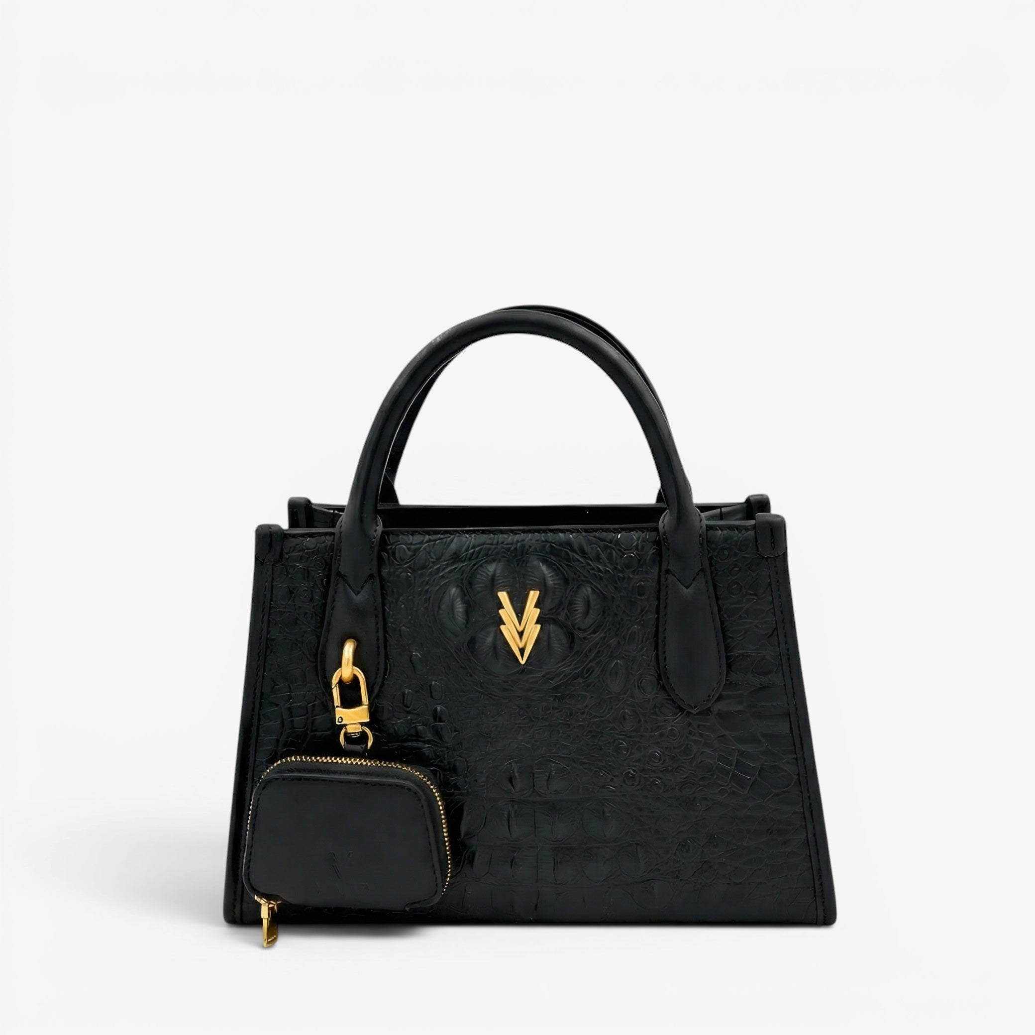 Black handbag with gold accents on a light gray background