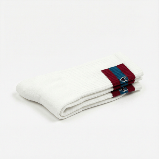 White socks with red and blue striped cuffs on a white background