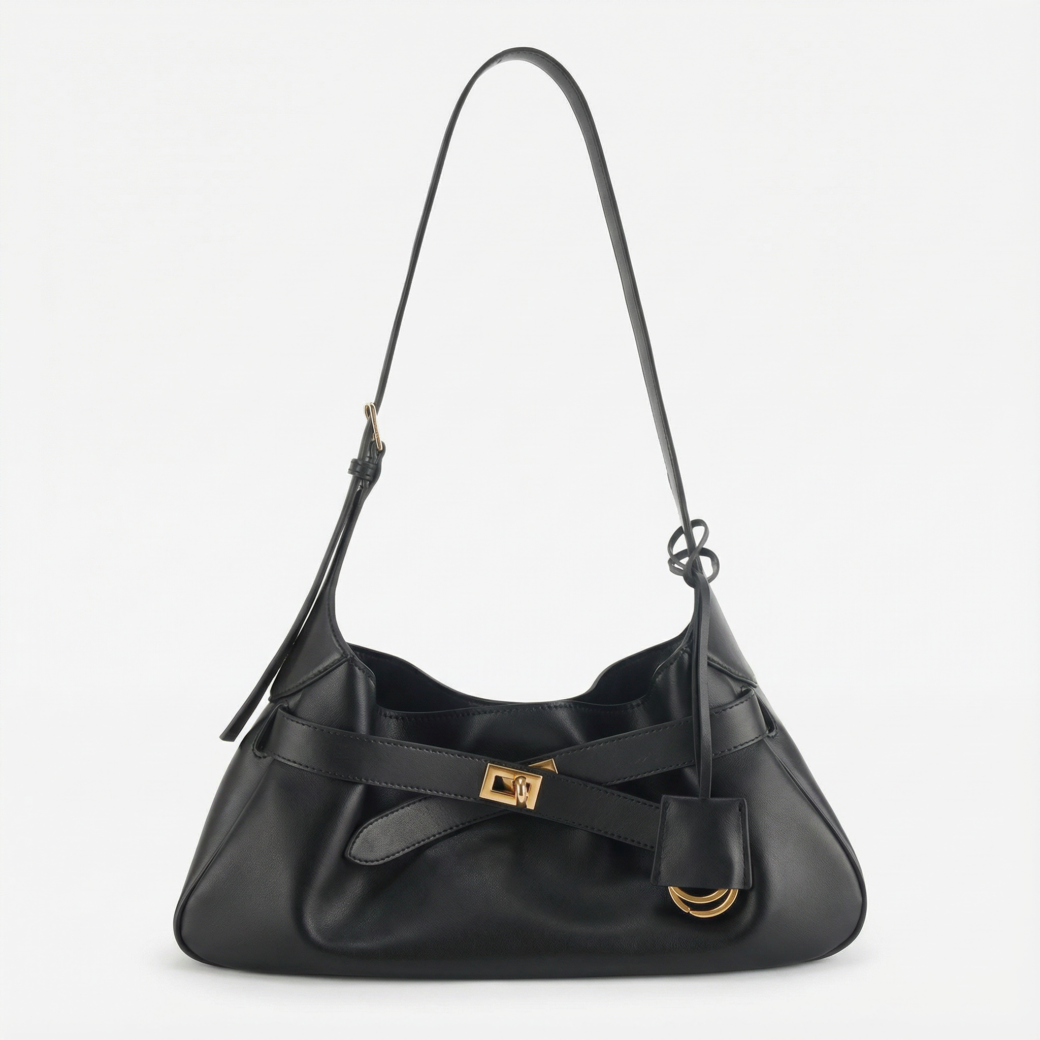 Black handbag with gold accents on a light gray background