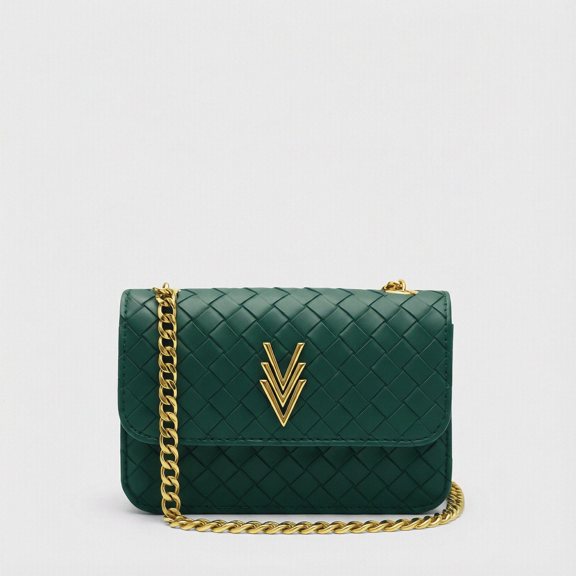 Green handbag with gold chain and logo on a light gray background