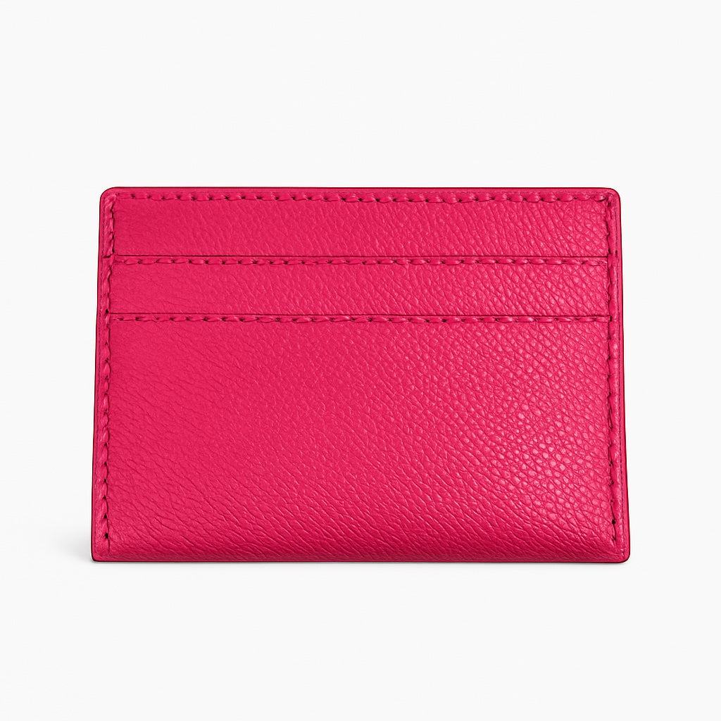 Pink leather cardholder on a white background