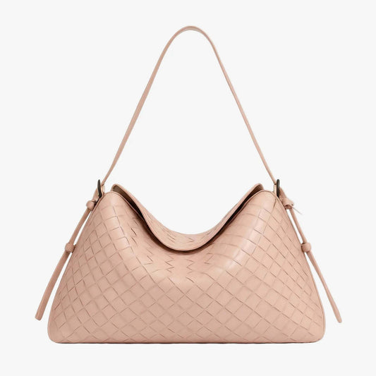 Beige handbag with woven pattern on a light gray background