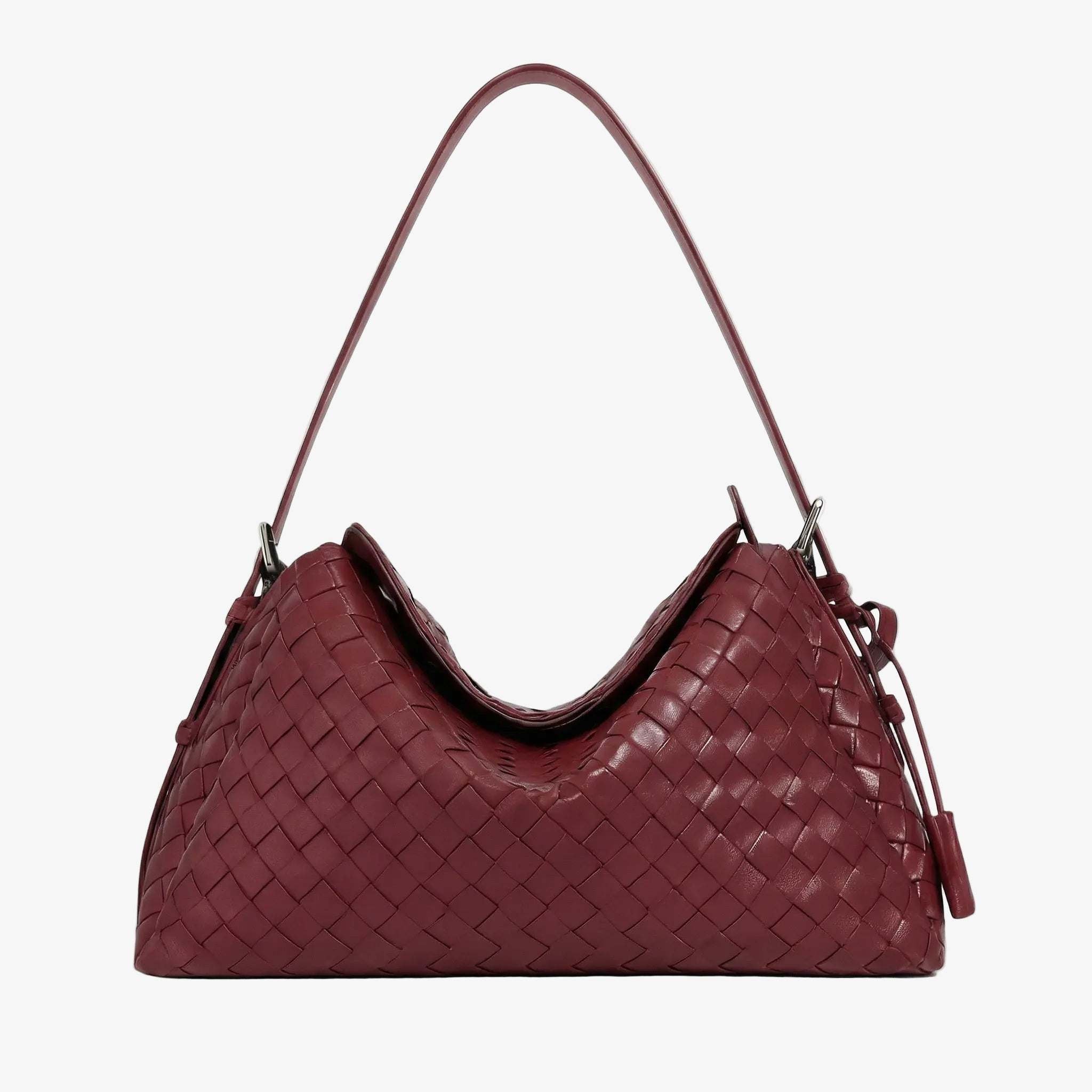 Maroon woven handbag on a light gray background