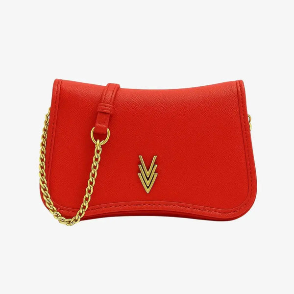 Red handbag with a gold chain and emblem on a white background