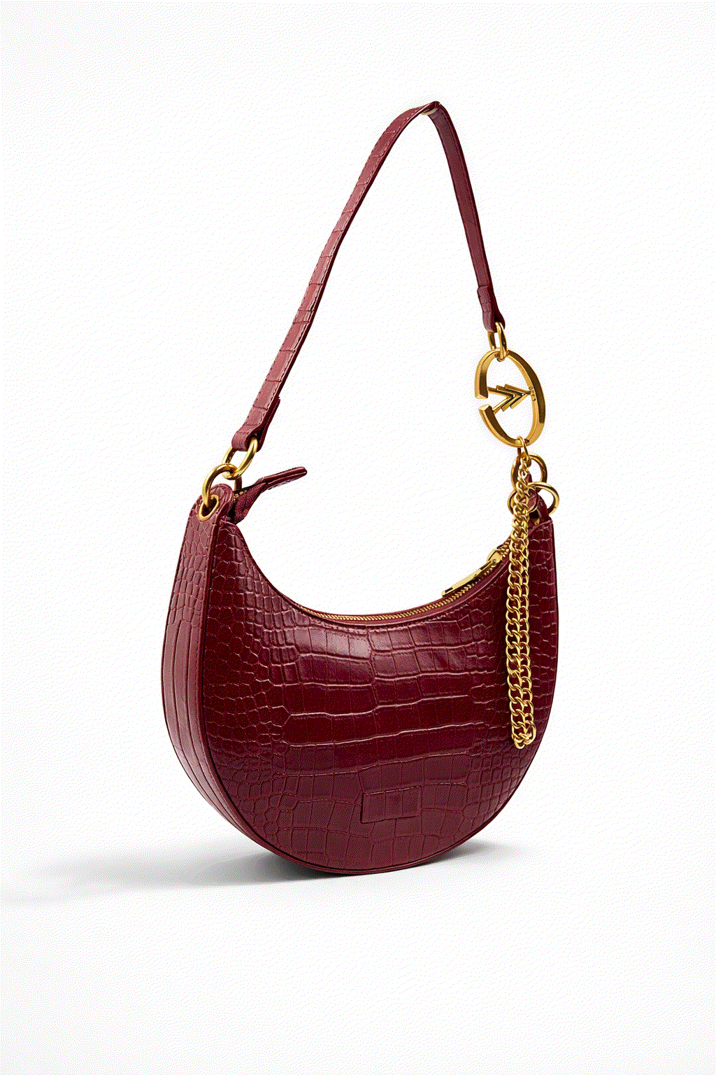 Maroon handbag with gold chain detail on a white background