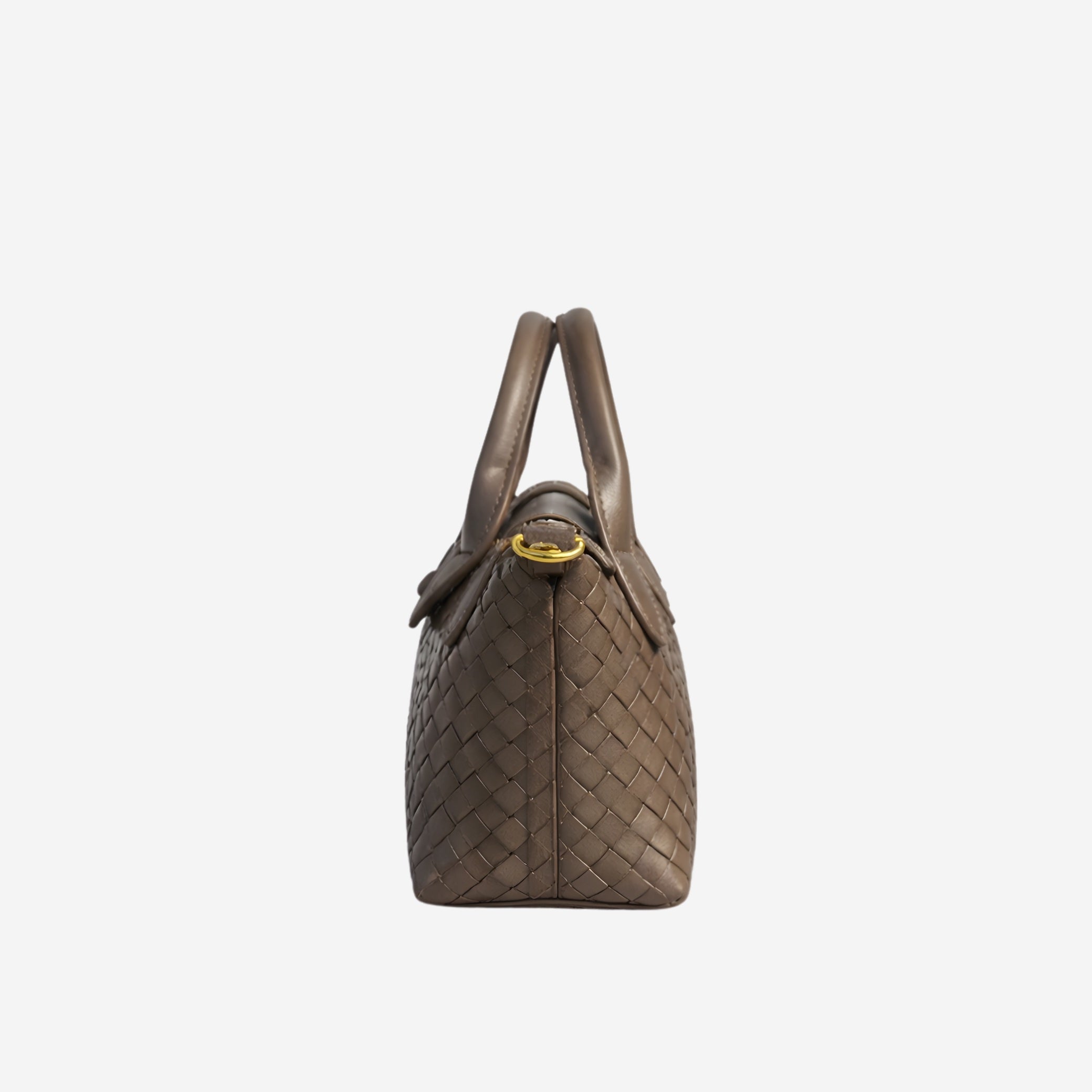 Brown woven handbag with a gold clasp on a white background