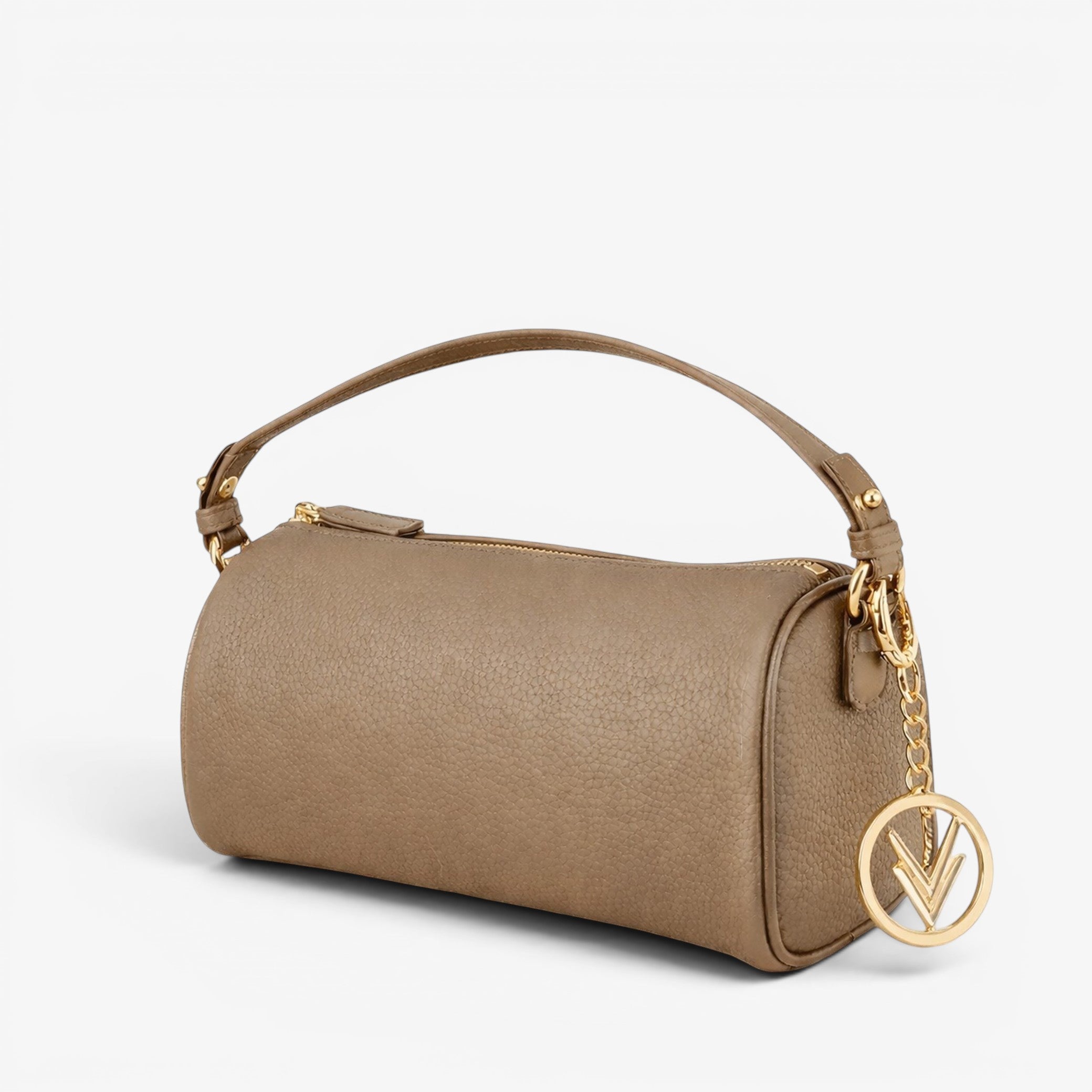 Beige handbag with a gold handle and matching keychain on a white background