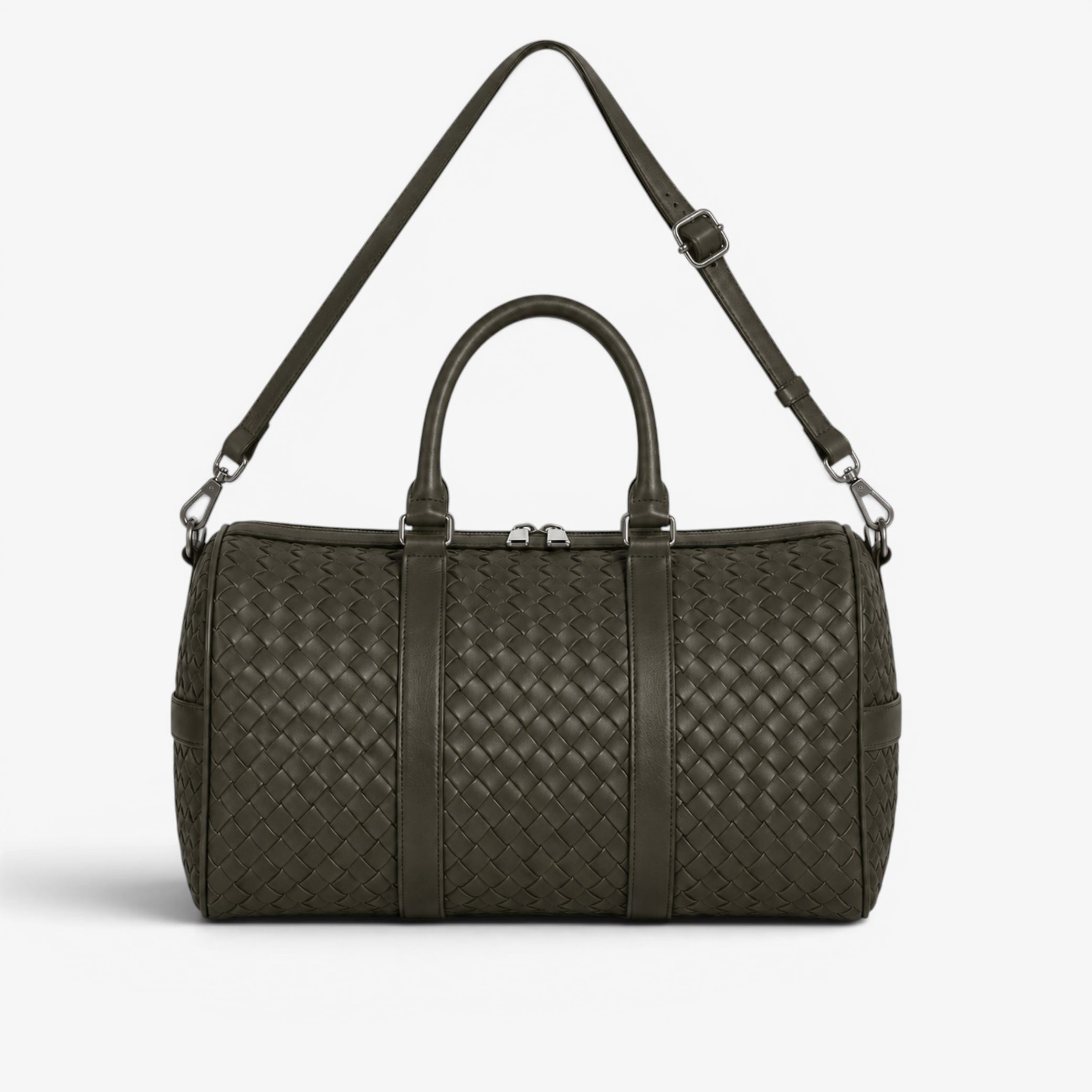 Green woven duffel bag with shoulder strap on a white background