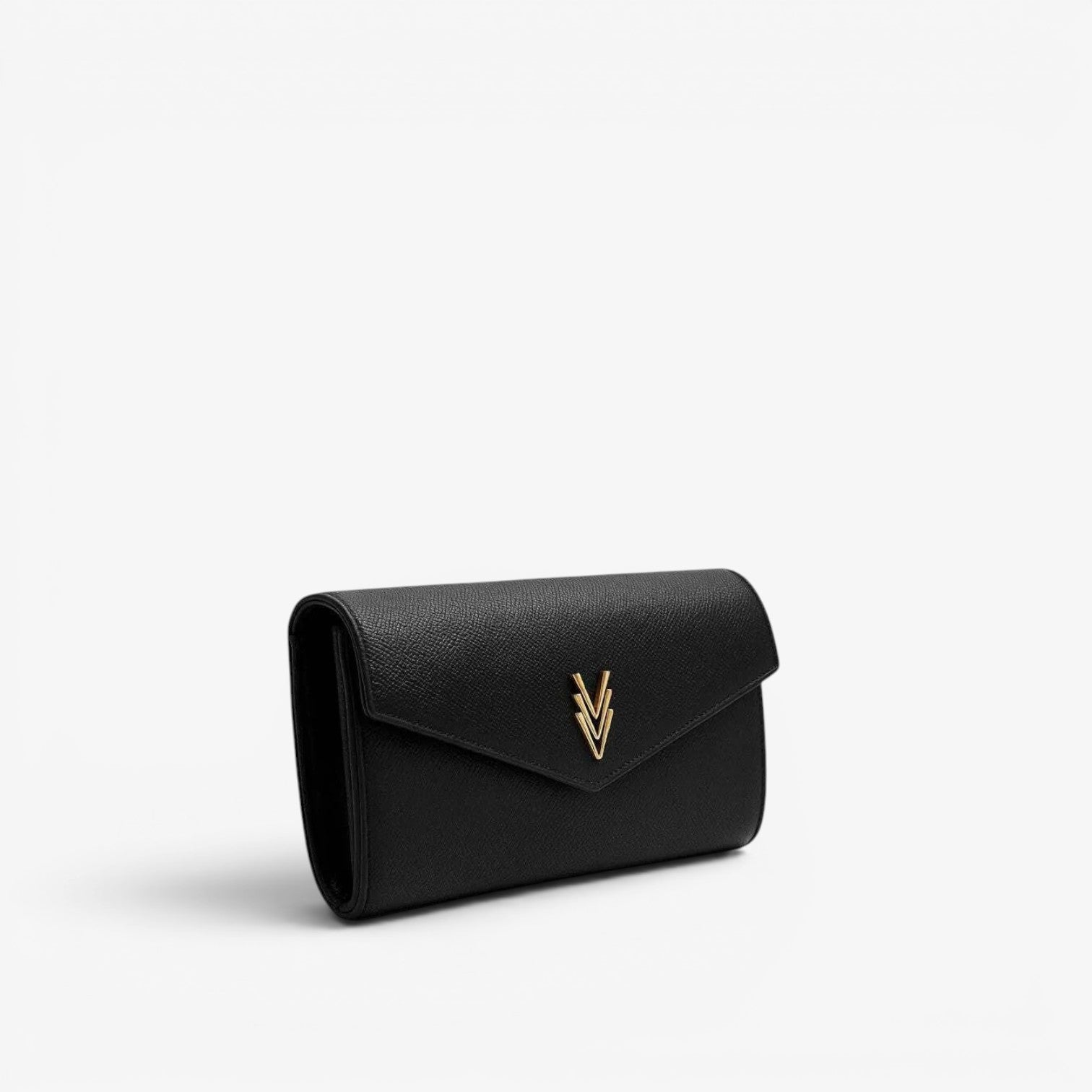 Black clutch bag with a gold emblem on a white background