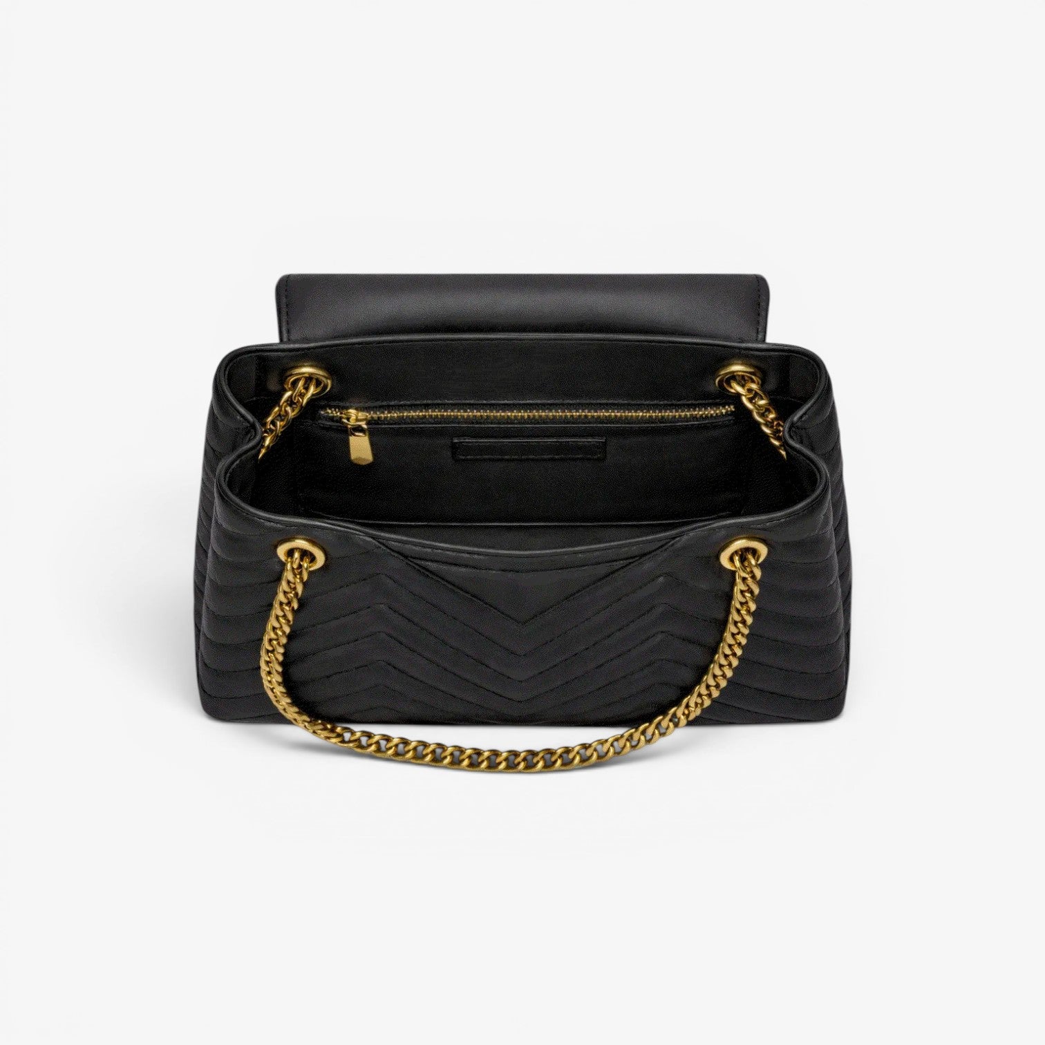 Black handbag with gold chain handle on a white background
