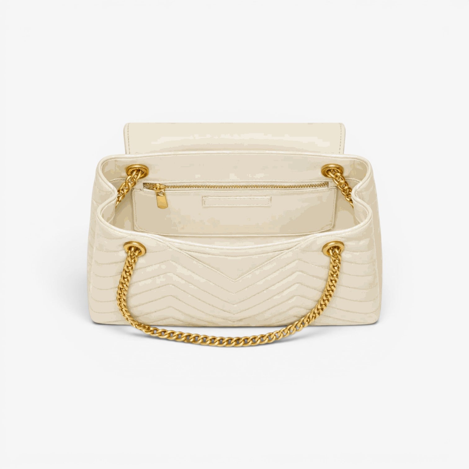 Cream-colored handbag with gold chain detail on a white background