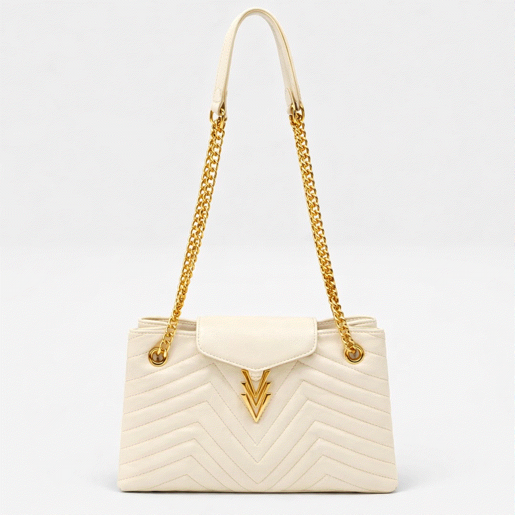 Cream-colored handbag with gold chain strap and clasp on a white background