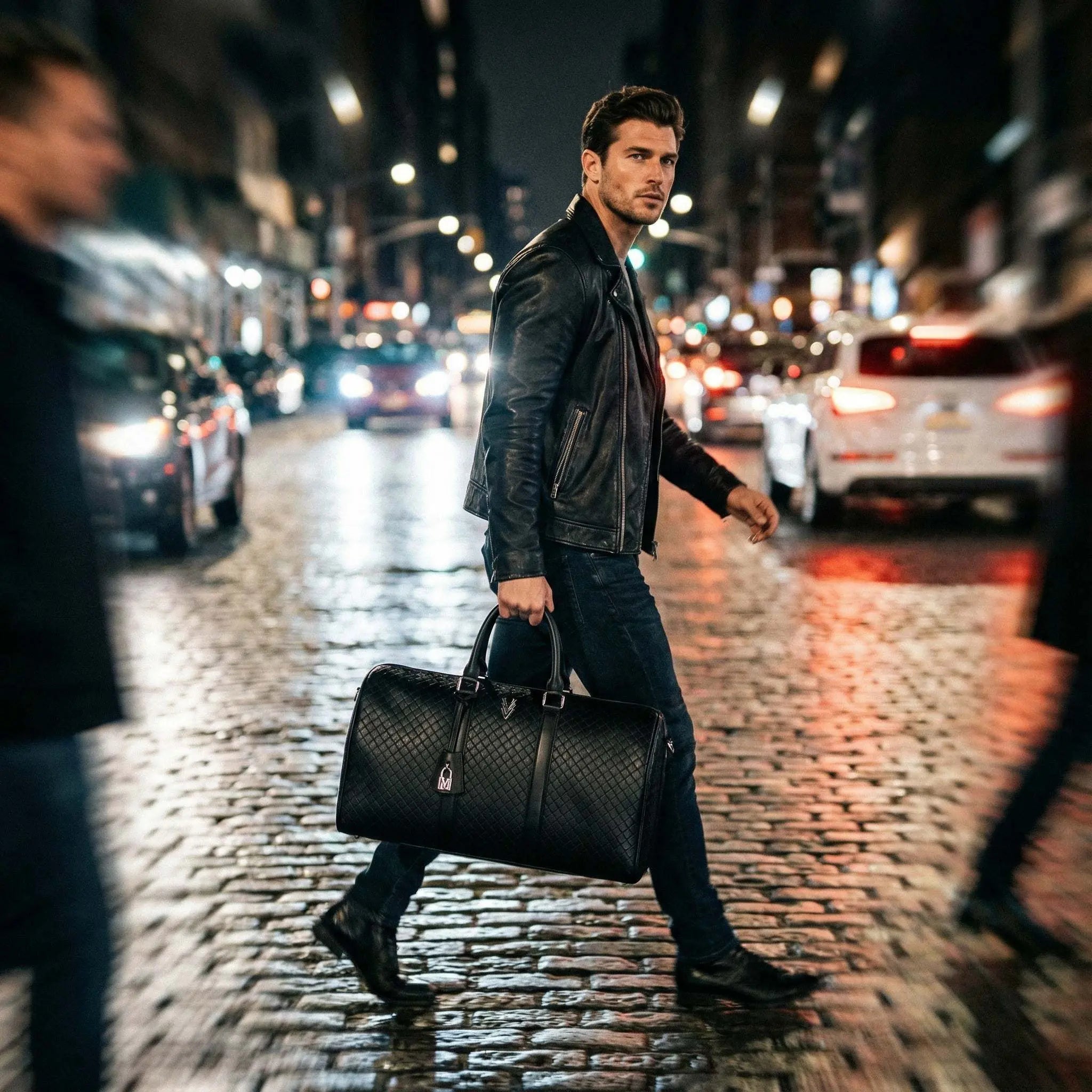 Man walking on a city street at night with a black leather bag