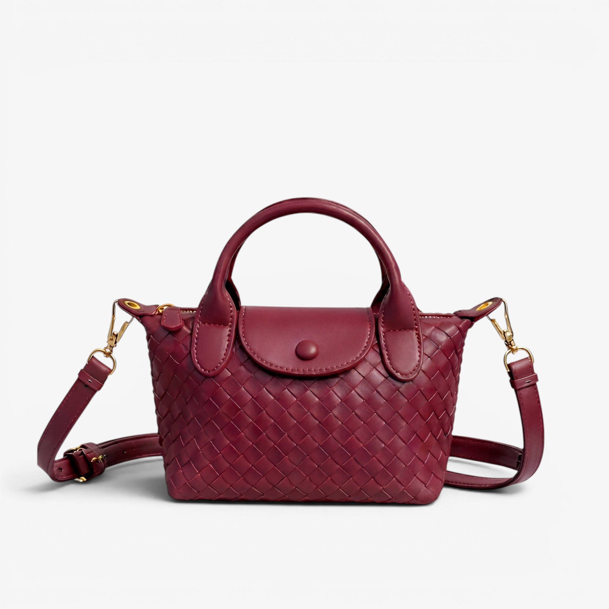Maroon handbag with woven pattern on a white background