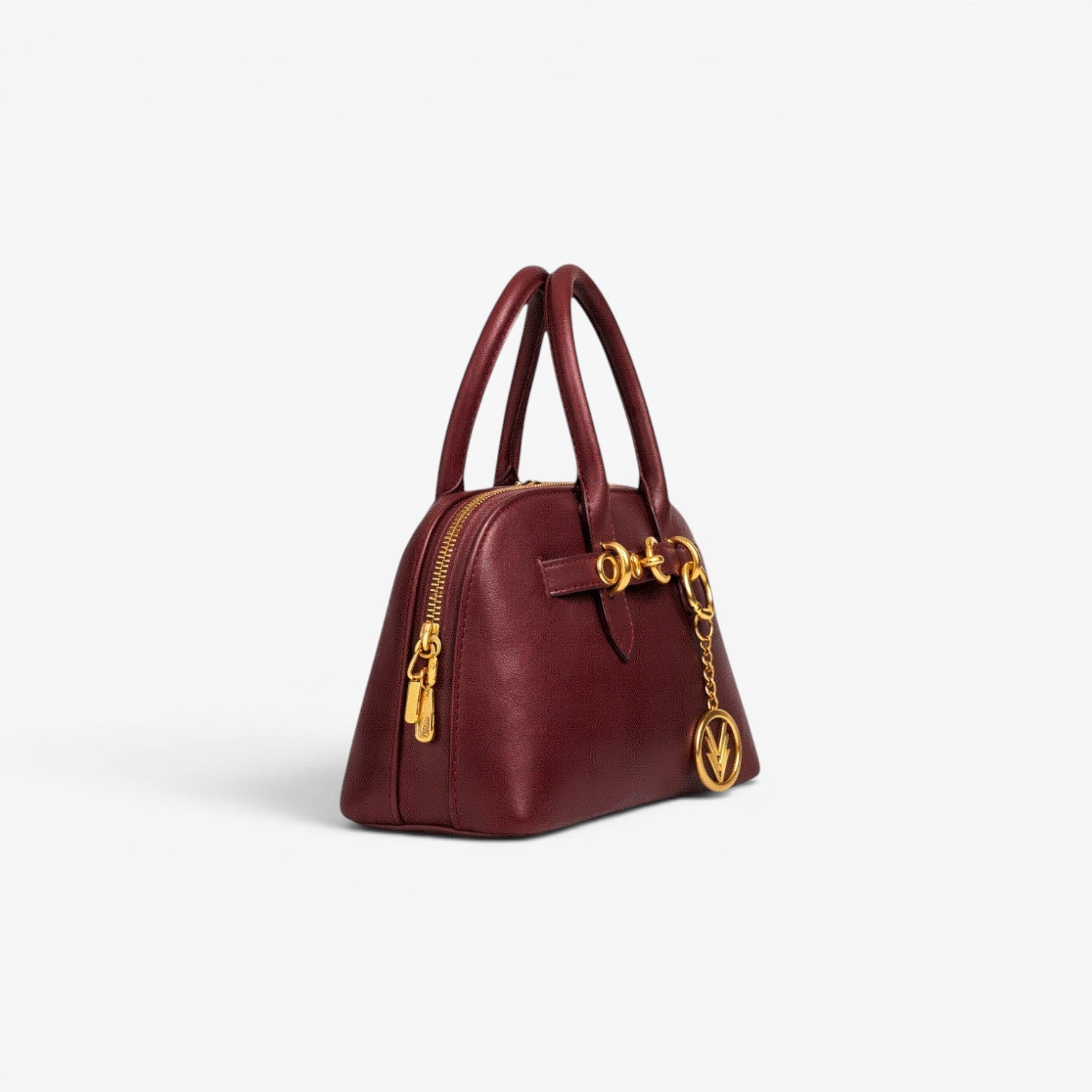 Maroon handbag with gold accents on a white background