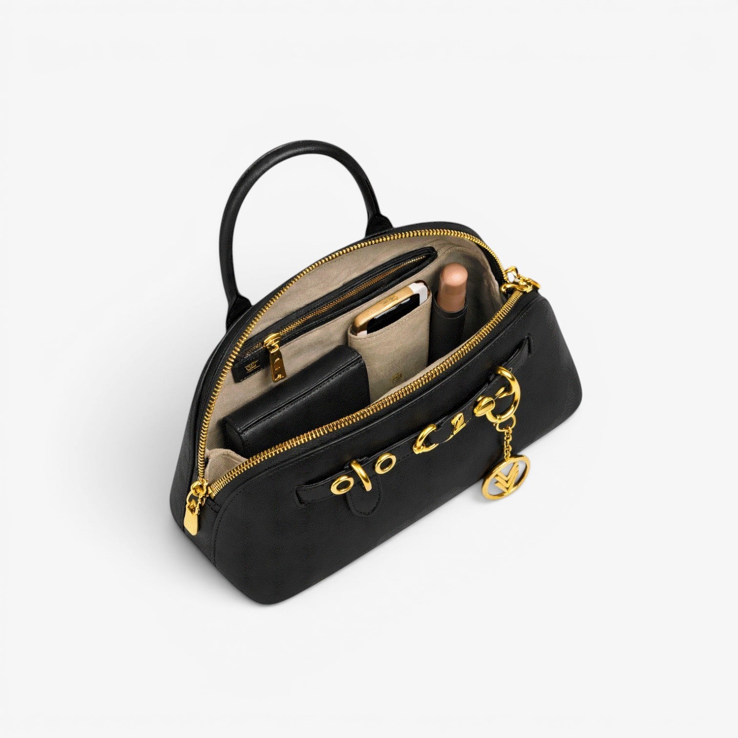 VAGOSHOPS Freya black leather purse with gold hardware and iconic Three V charm, shown with phone, lipstick, and wallet inside.