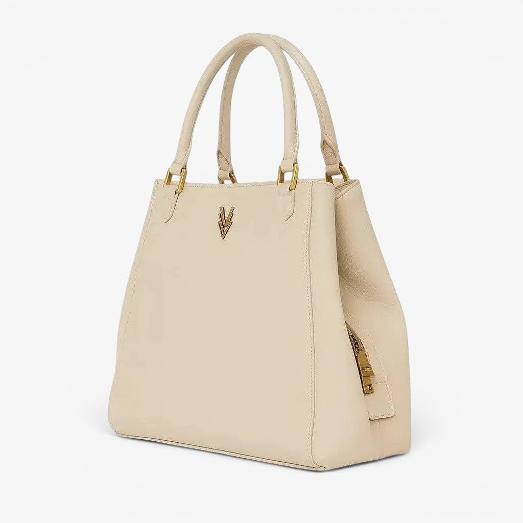 VAGOSHOPS cream pebble-embossed vegan leather Mari shoulder purse with dual straps and central zip compartment.